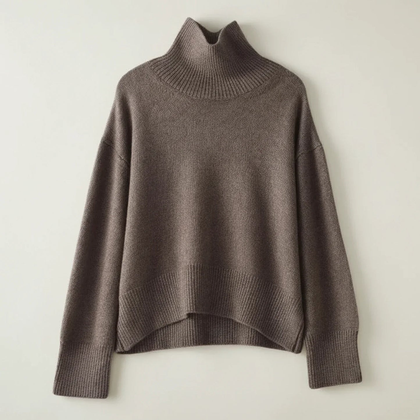 Women's oversized turtleneck knit sweater with ribbed texture, cozy relaxed fit for casual layering