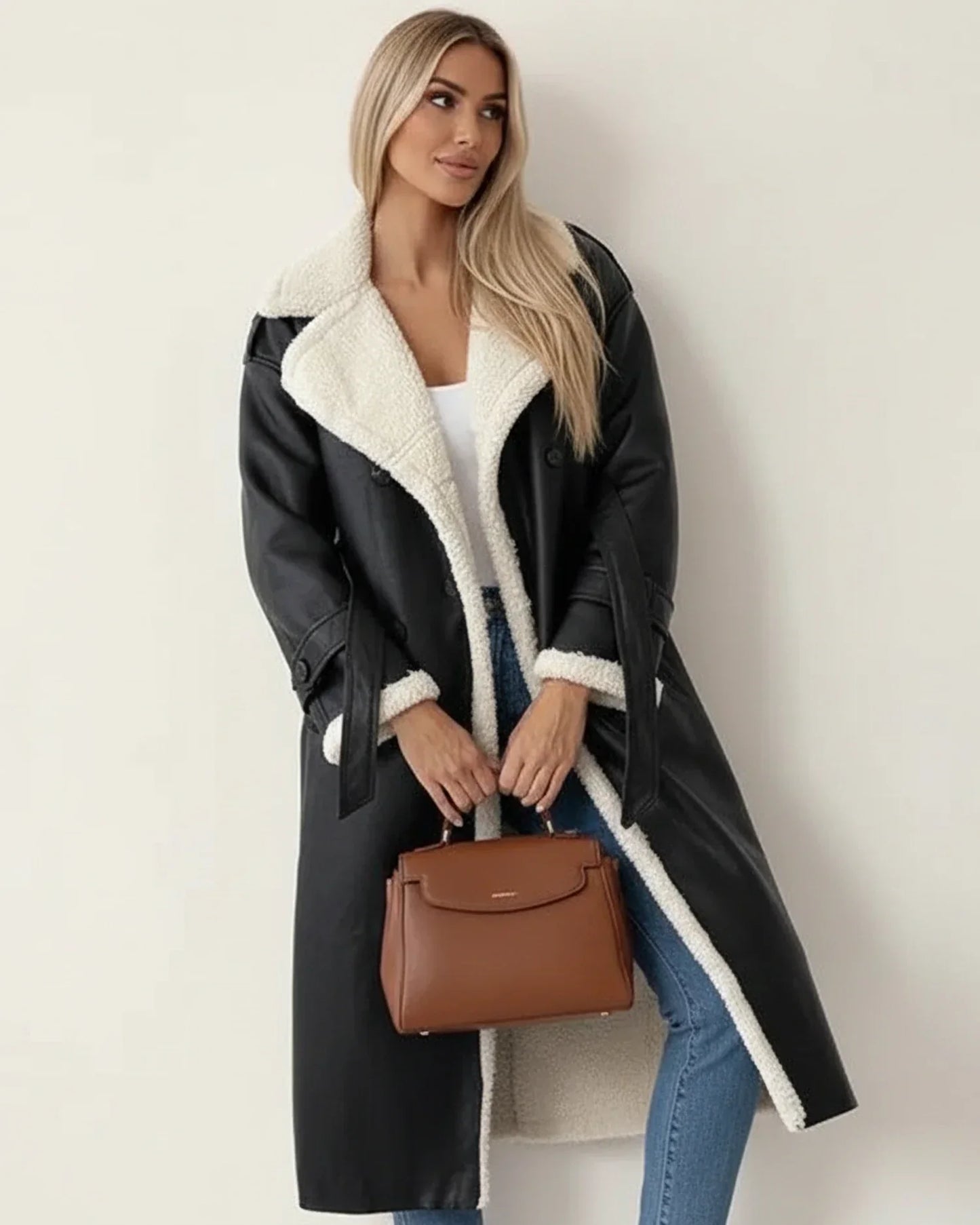 Women's long sherpa winter coat with cozy trim, belted double-breasted design in neutral tone