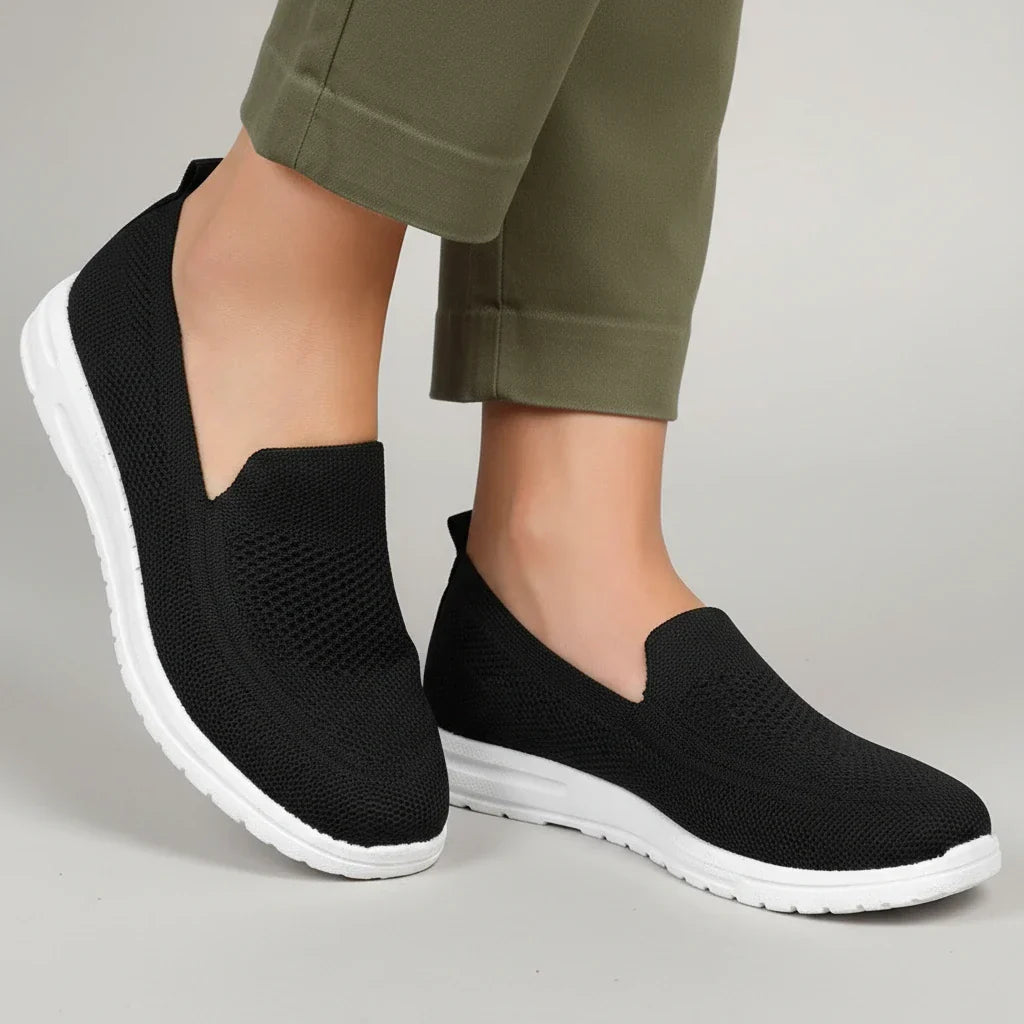 Women's slip-on knit sneakers with cushioned white sole for all-day orthopedic comfort
