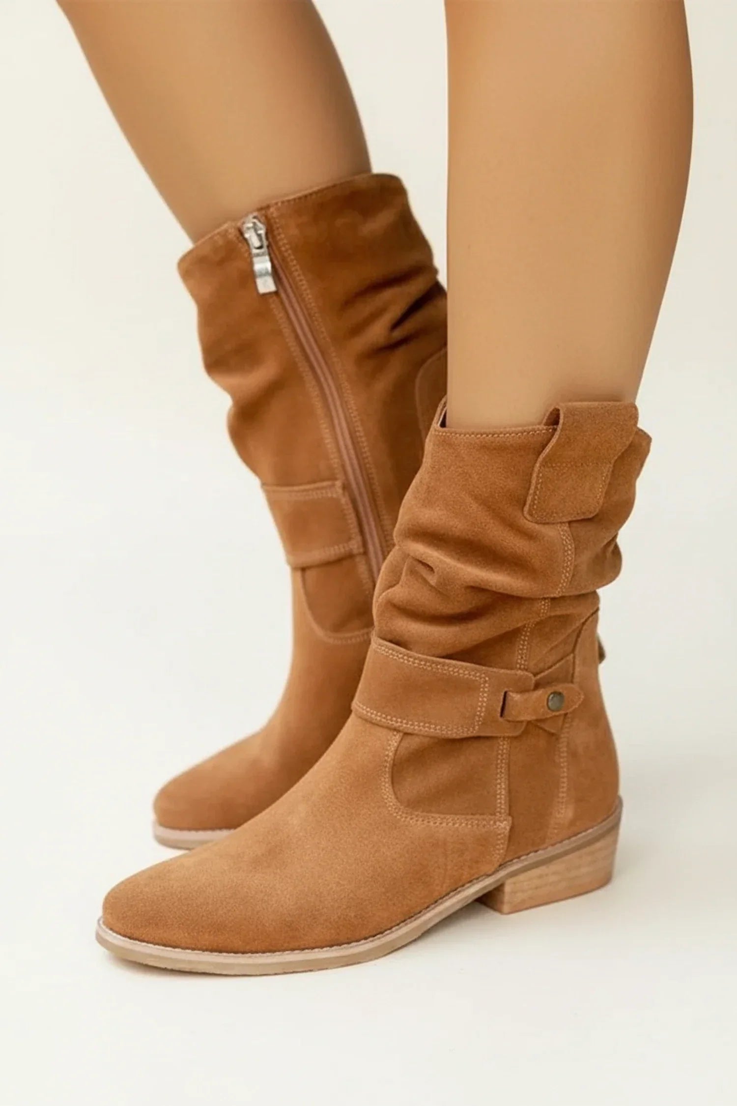 Women's black slouch ankle boots with buckle detail, pull-on style for casual everyday comfort