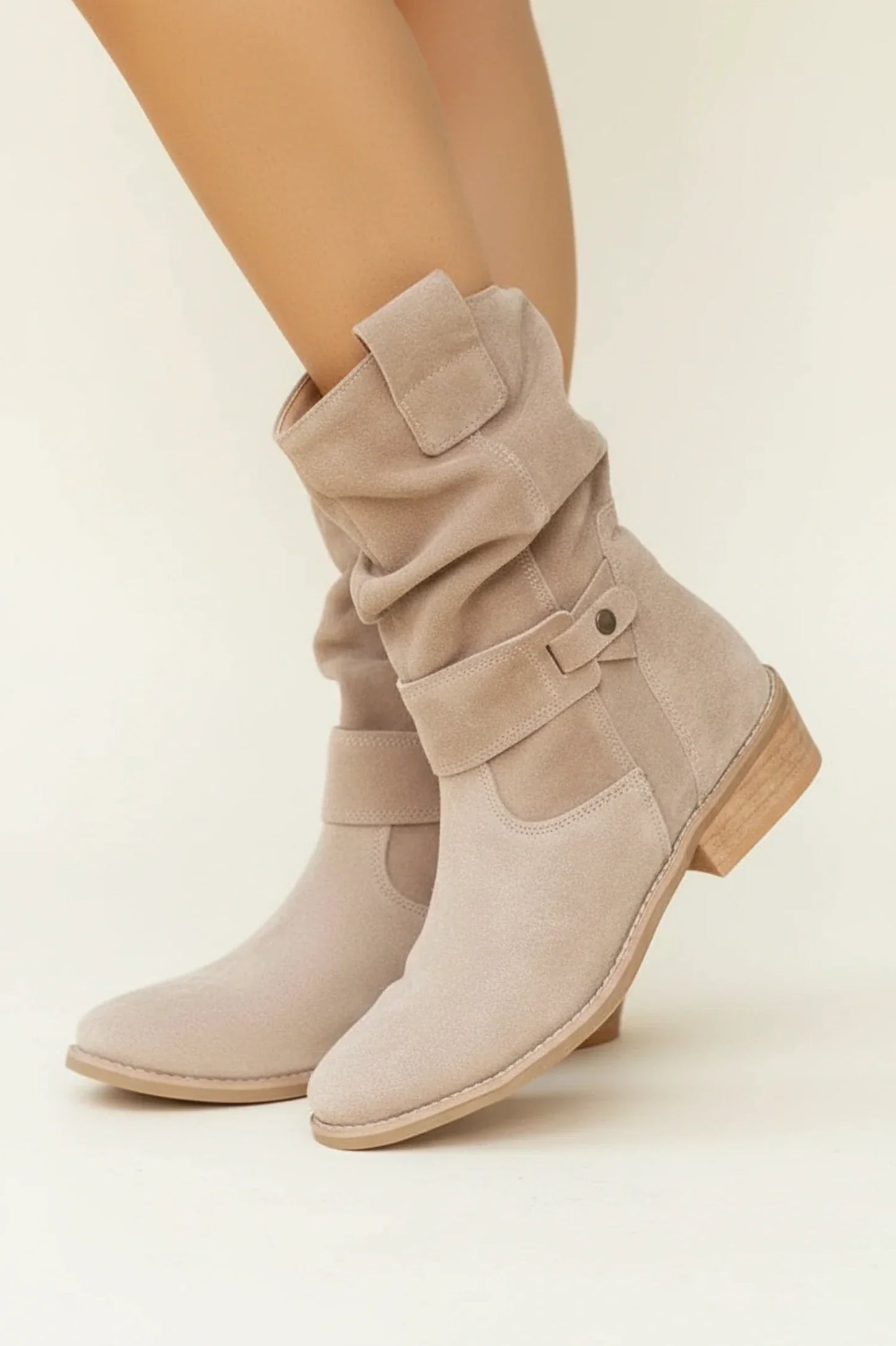 Women's black slouch ankle boots with buckle detail, pull-on casual style for everyday comfort