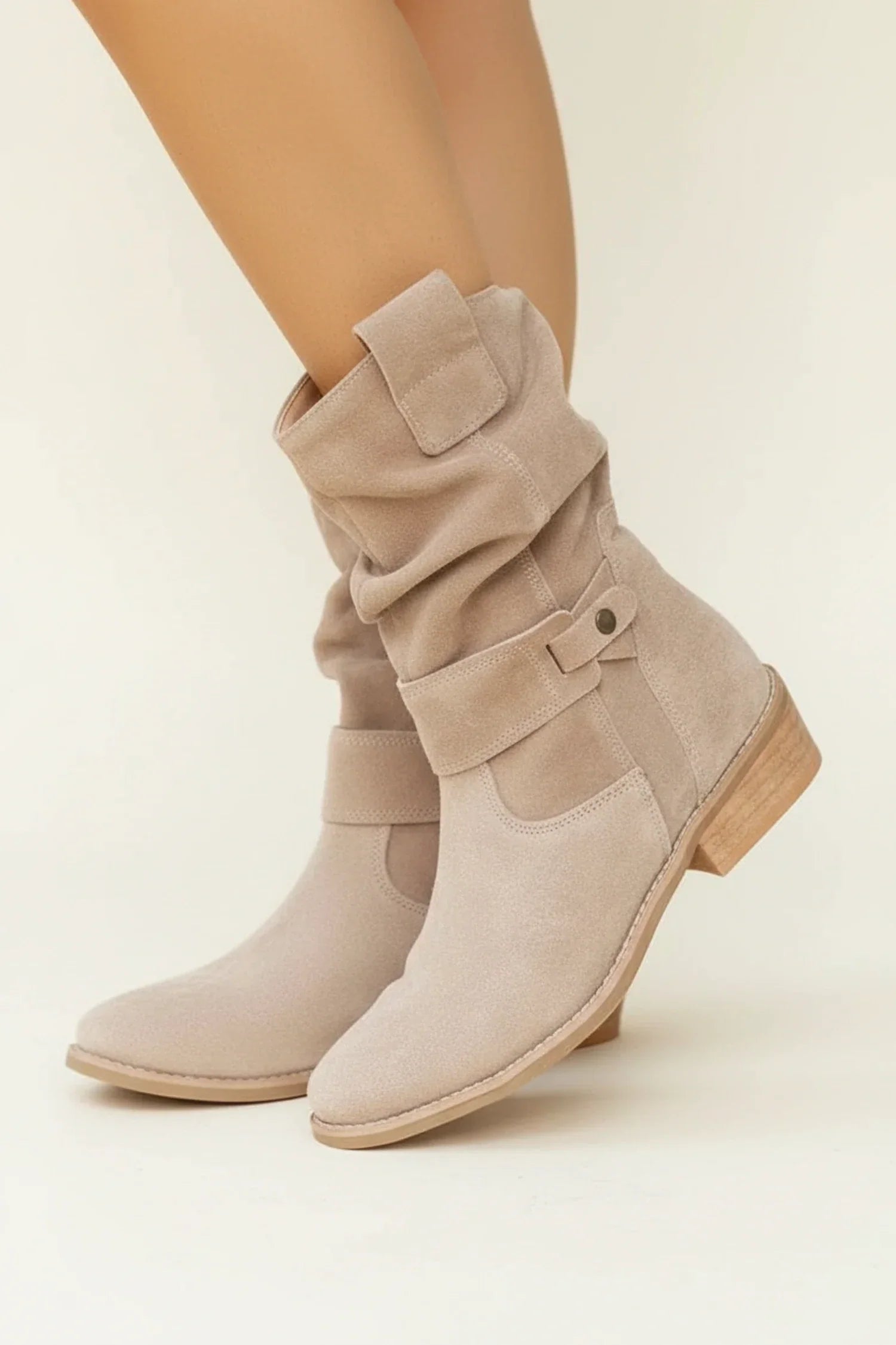 Women's black slouch ankle boots with buckle detail, pull-on casual style for everyday comfort