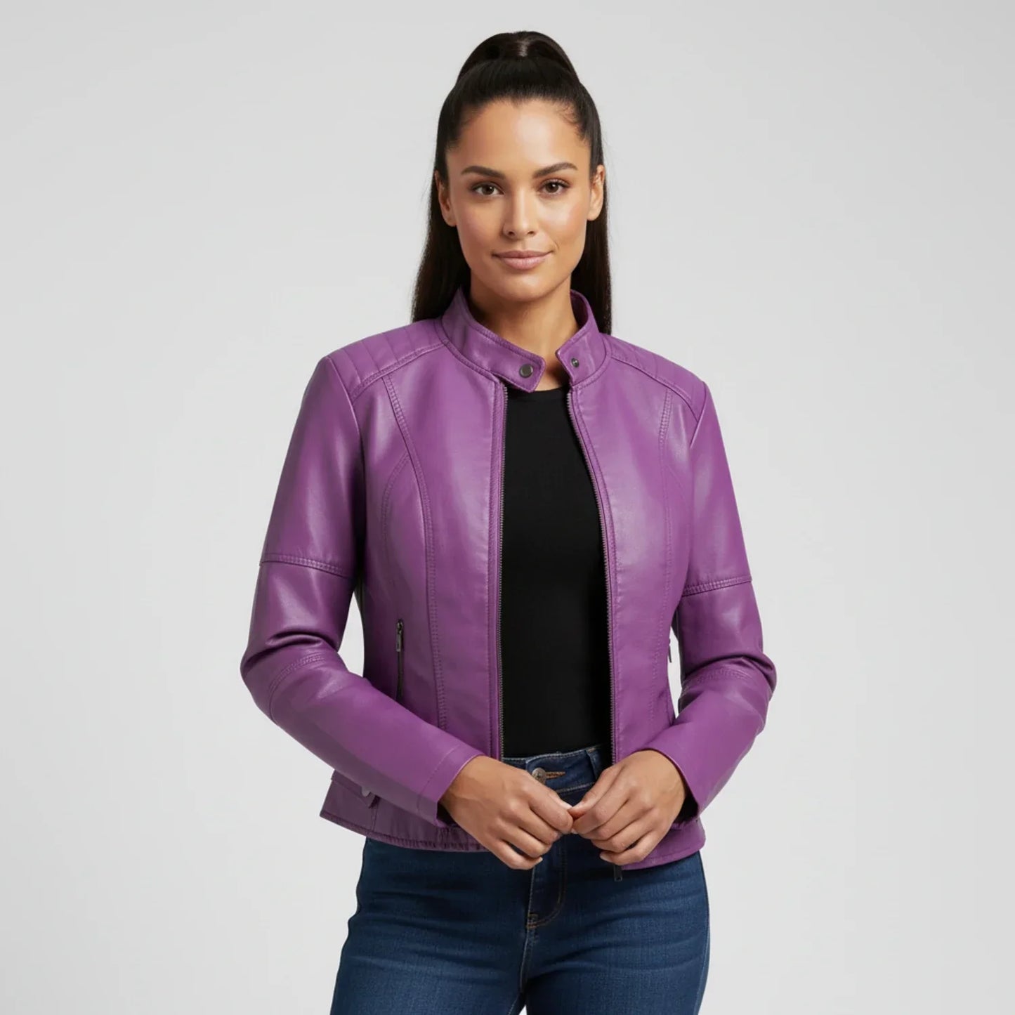 Women's black moto biker jacket with stand collar, zip pockets, and edgy street-ready silhouette