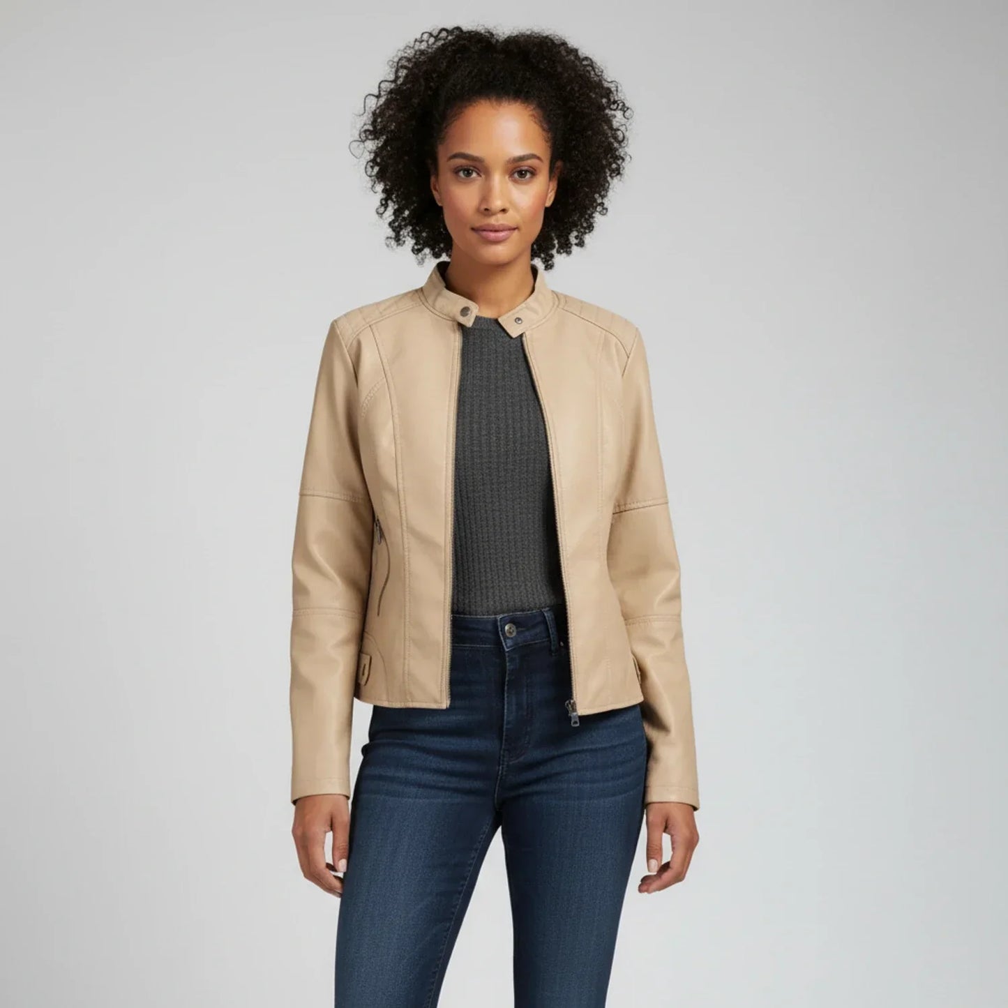 Women's black moto biker jacket with stand collar, zip pockets, and edgy street-ready silhouette
