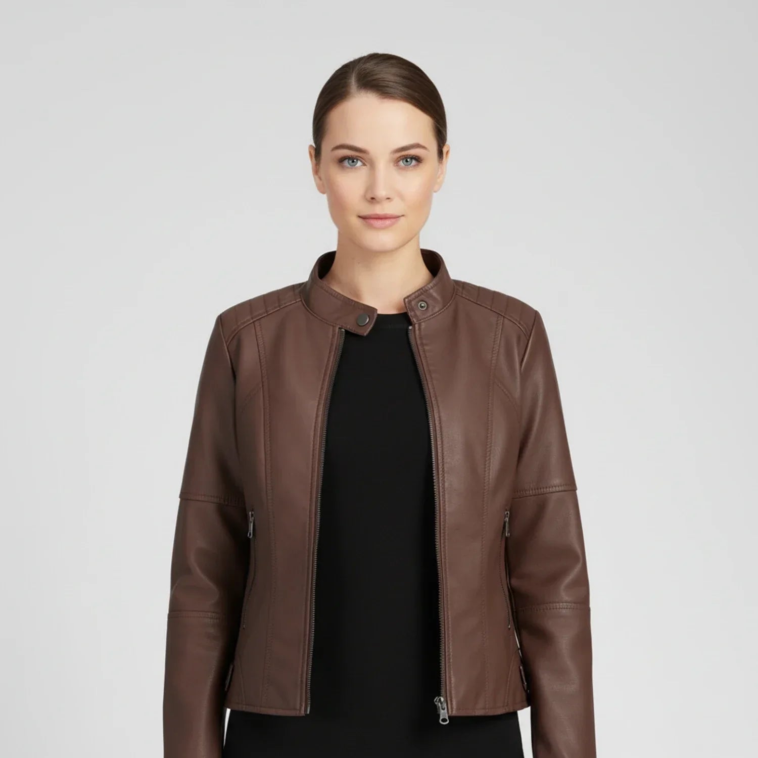 Women's black moto biker jacket with stand collar, zip pockets, and edgy street-ready silhouette