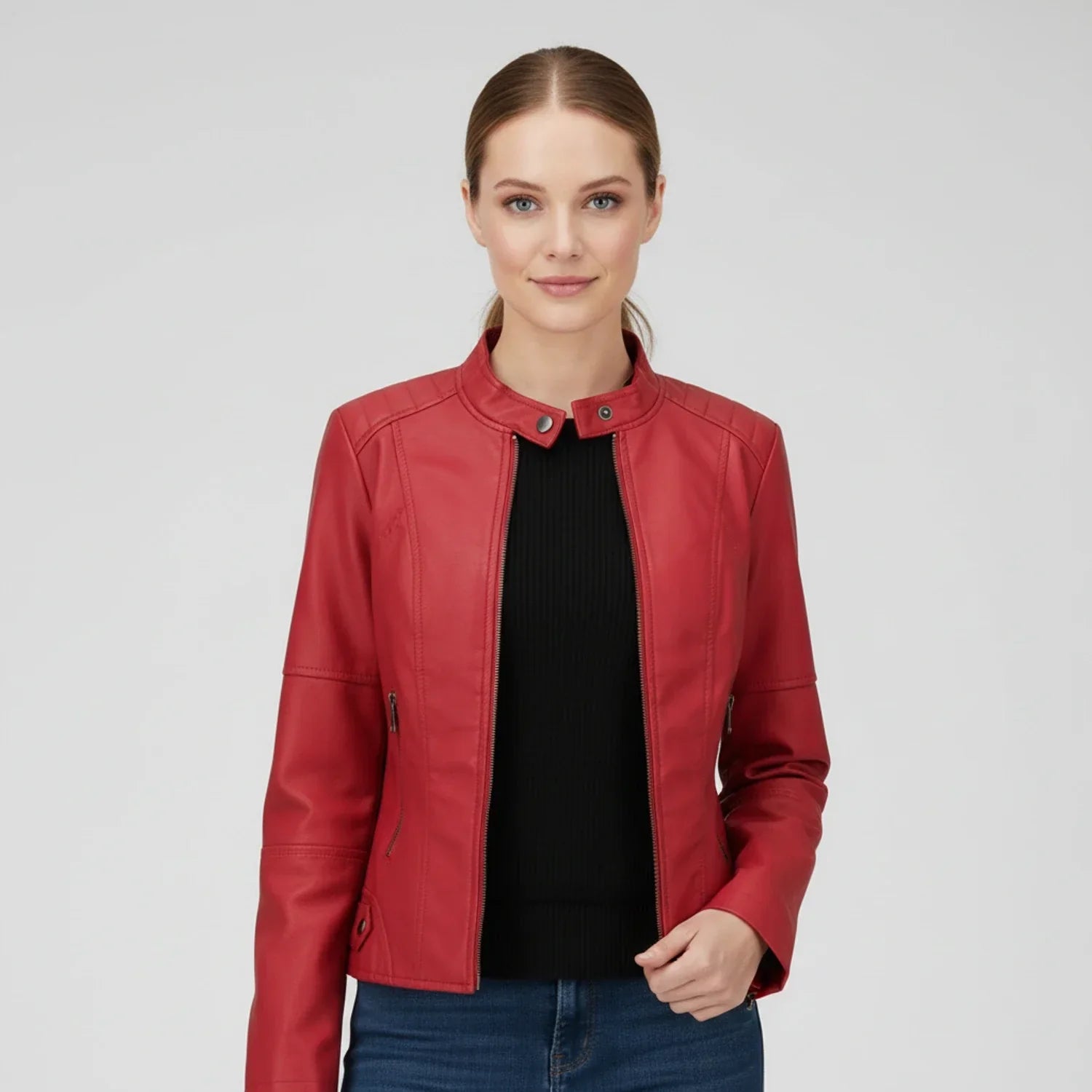 Women's black moto biker jacket with stand collar, zip pockets, and edgy street-ready silhouette