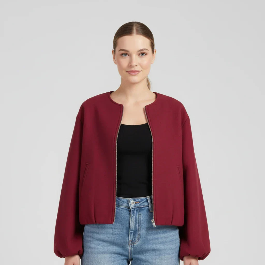 Women's cropped bomber jacket balloon sleeves zip-up collarless silhouette versatile layering piece