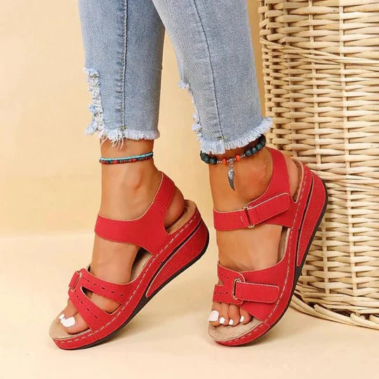 Women's adjustable walking sandals with twin buckle straps, open heel slip-on flat footbed design
