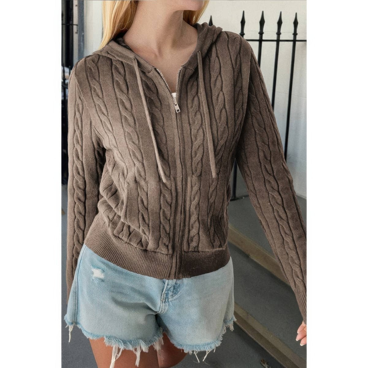 Women's cable knit hooded jacket with cozy front pockets, relaxed fit, chunky texture