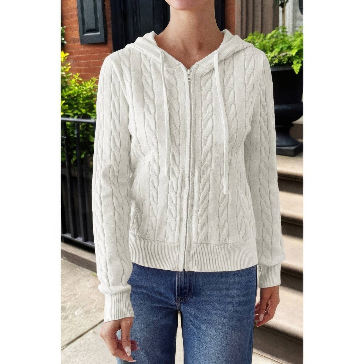Women's cable knit hooded jacket with chunky texture, cozy front pockets, relaxed fit everyday warmth