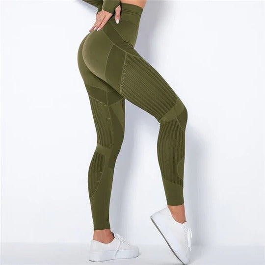 Women's black high-rise anti-cellulite compression leggings with textured sculpting surface