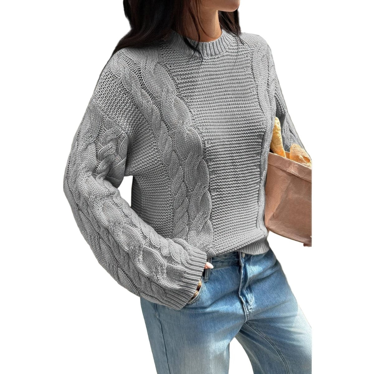 Women's cream cable knit pullover sweater with round neck, cozy textured pattern, soft acrylic layering essential