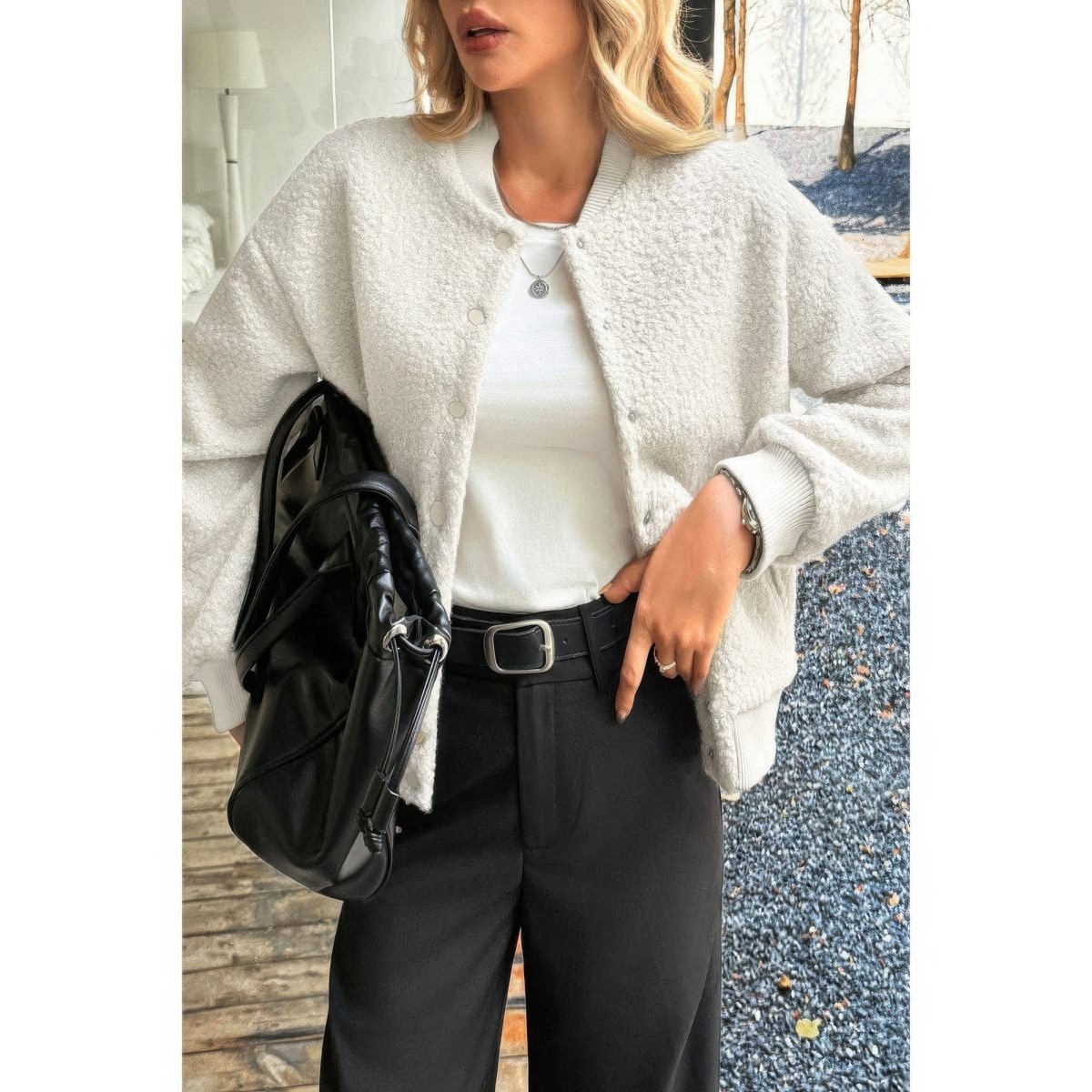 Women's ivory faux sherpa teddy bomber jacket with plush fuzzy texture and ribbed hem