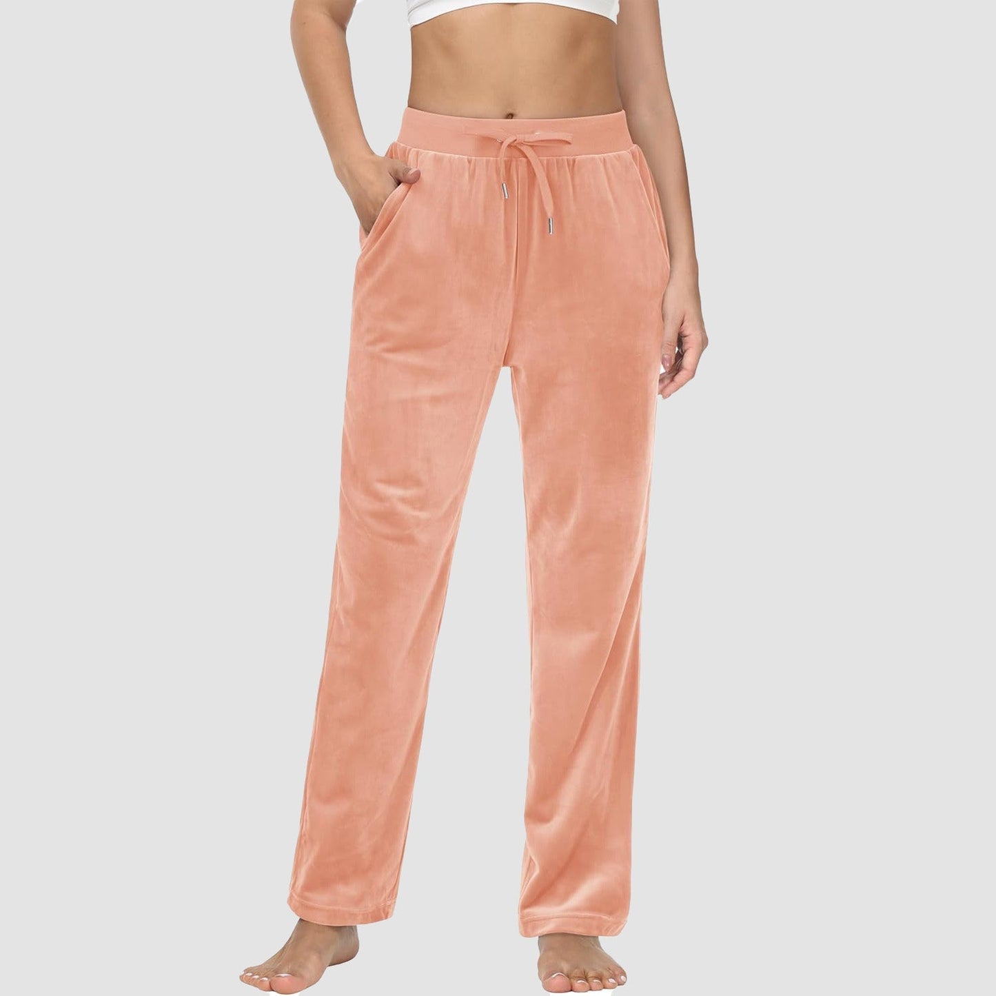 Women's fleece jogger pants with velvet lining, elastic waist, relaxed fit, and side pockets for cozy lounging