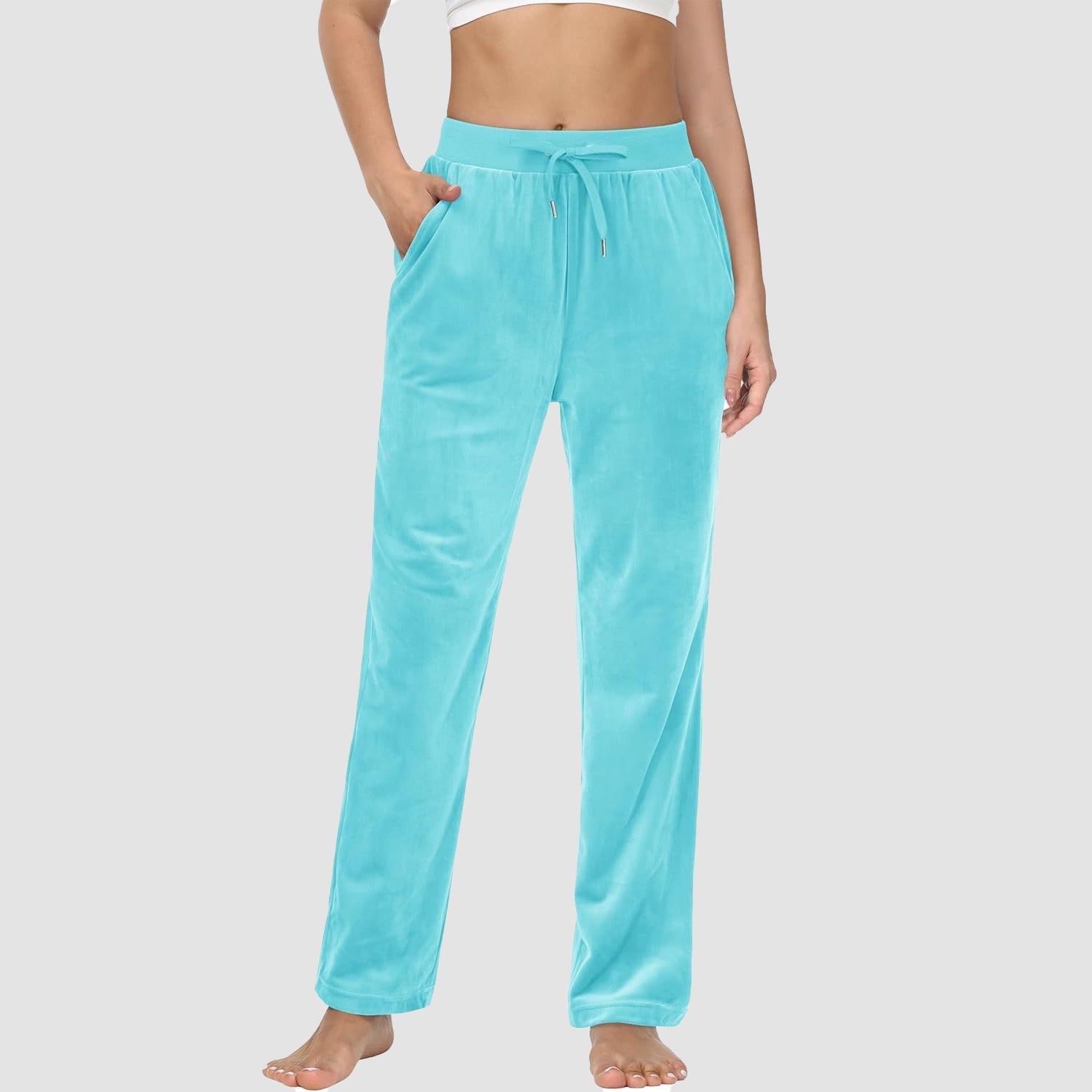Women's fleece jogger pants with velvet lining, elastic waist, relaxed fit, and side pockets for cozy lounging