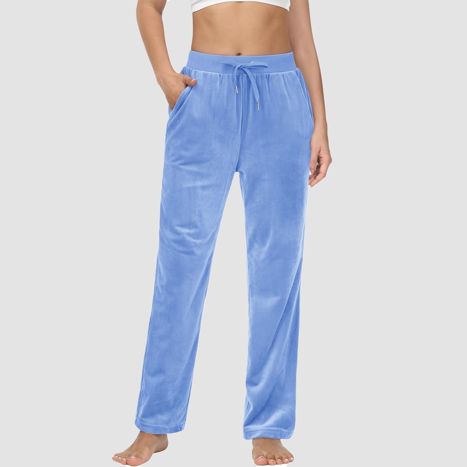 Women's fleece jogger pants with velvet lining, elastic waist, relaxed fit, and side pockets for cozy lounging