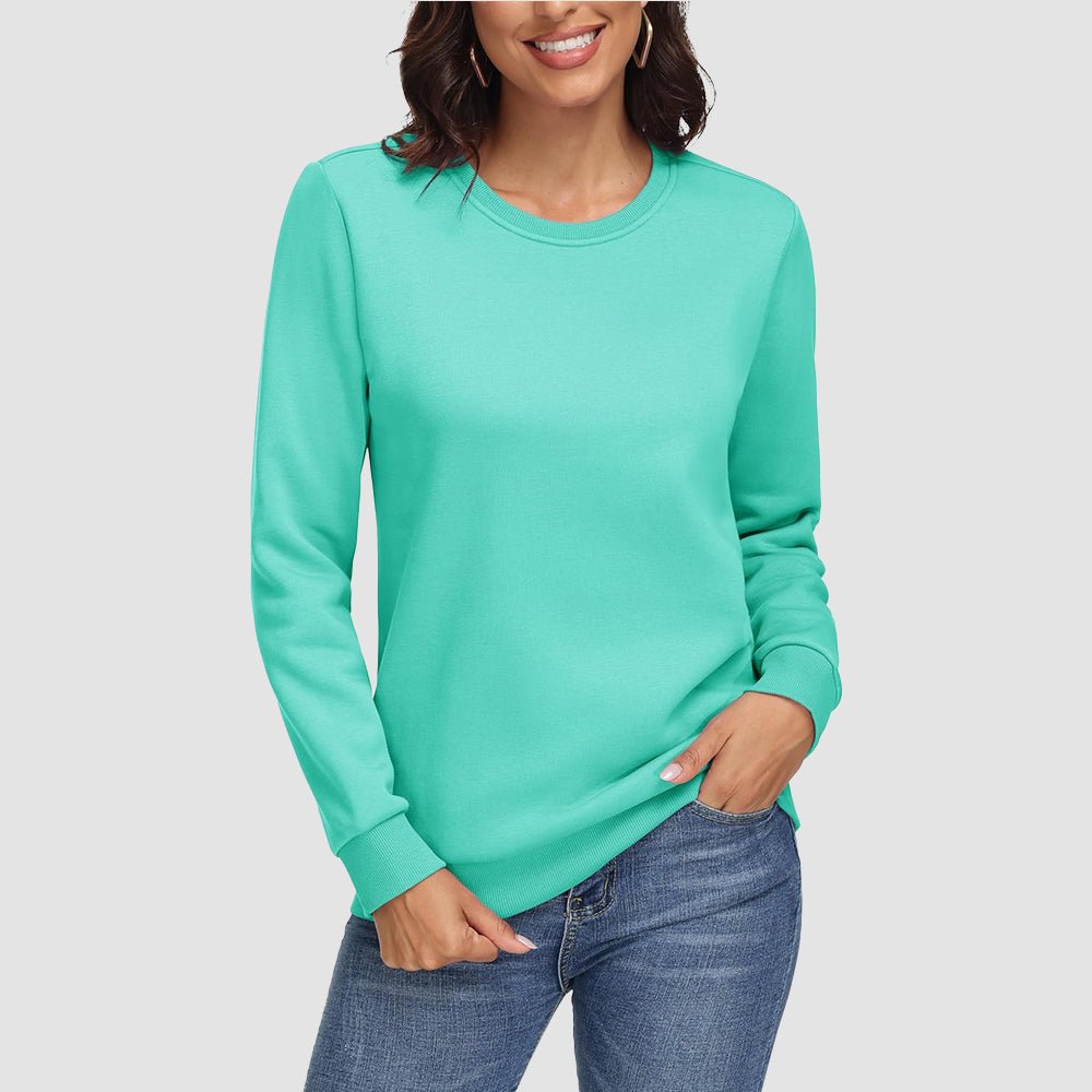 Women's cozy fleece crewneck sweatshirt long sleeve with ribbed cuffs for warmth and comfort