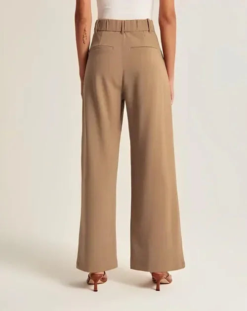 Emma wide-leg high-waist trousers with subtle crease detailing for smart casual elegant officewear