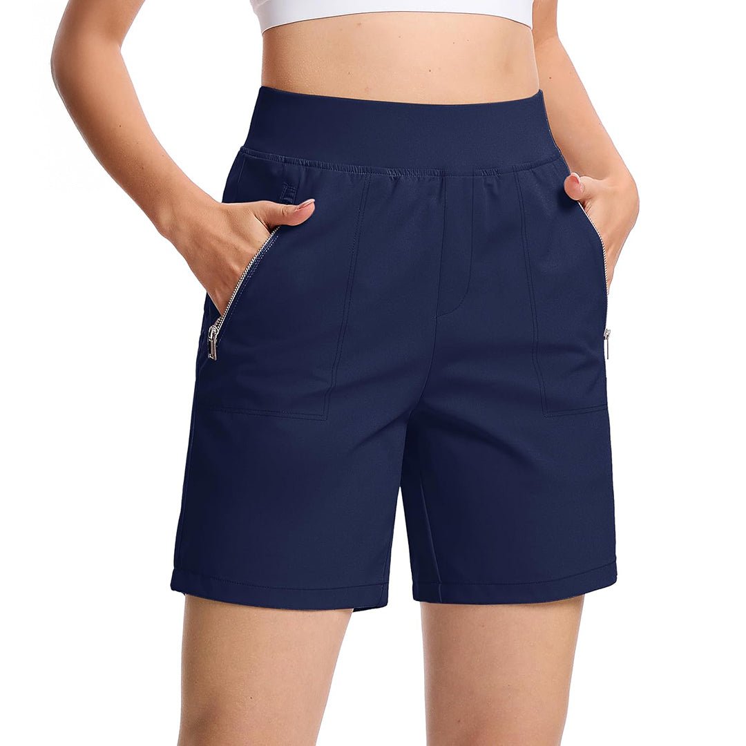 Women's high-waisted hiking shorts in neutral tone with zippered pockets and 4-way stretch active fit
