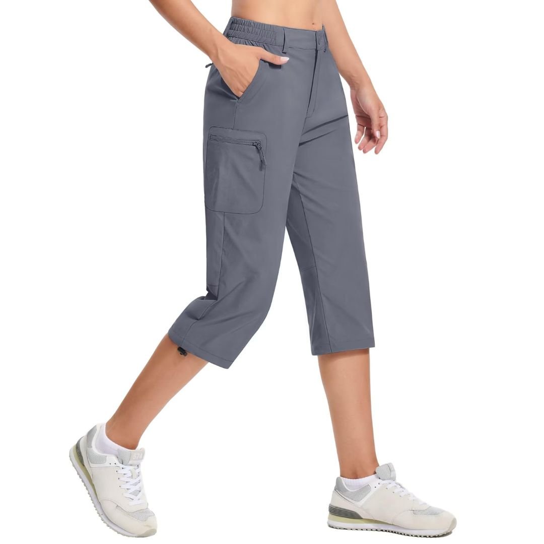 Women's hiking capri pants lightweight stretch water-resistant fabric with cargo pockets for outdoor use