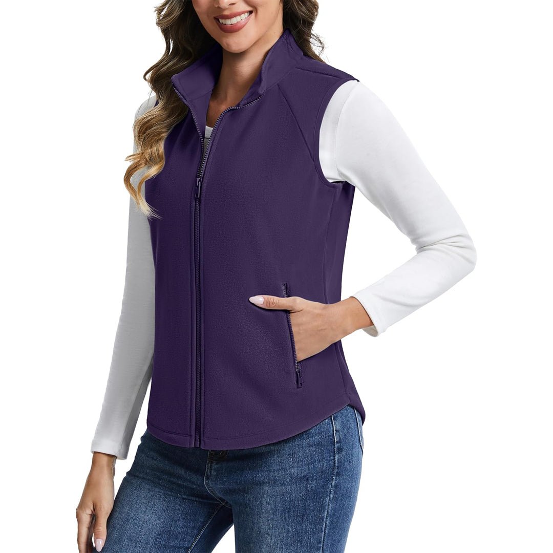 Women's lightweight full-zip fleece vest with stand-up collar, travel-ready warmth for fall winter