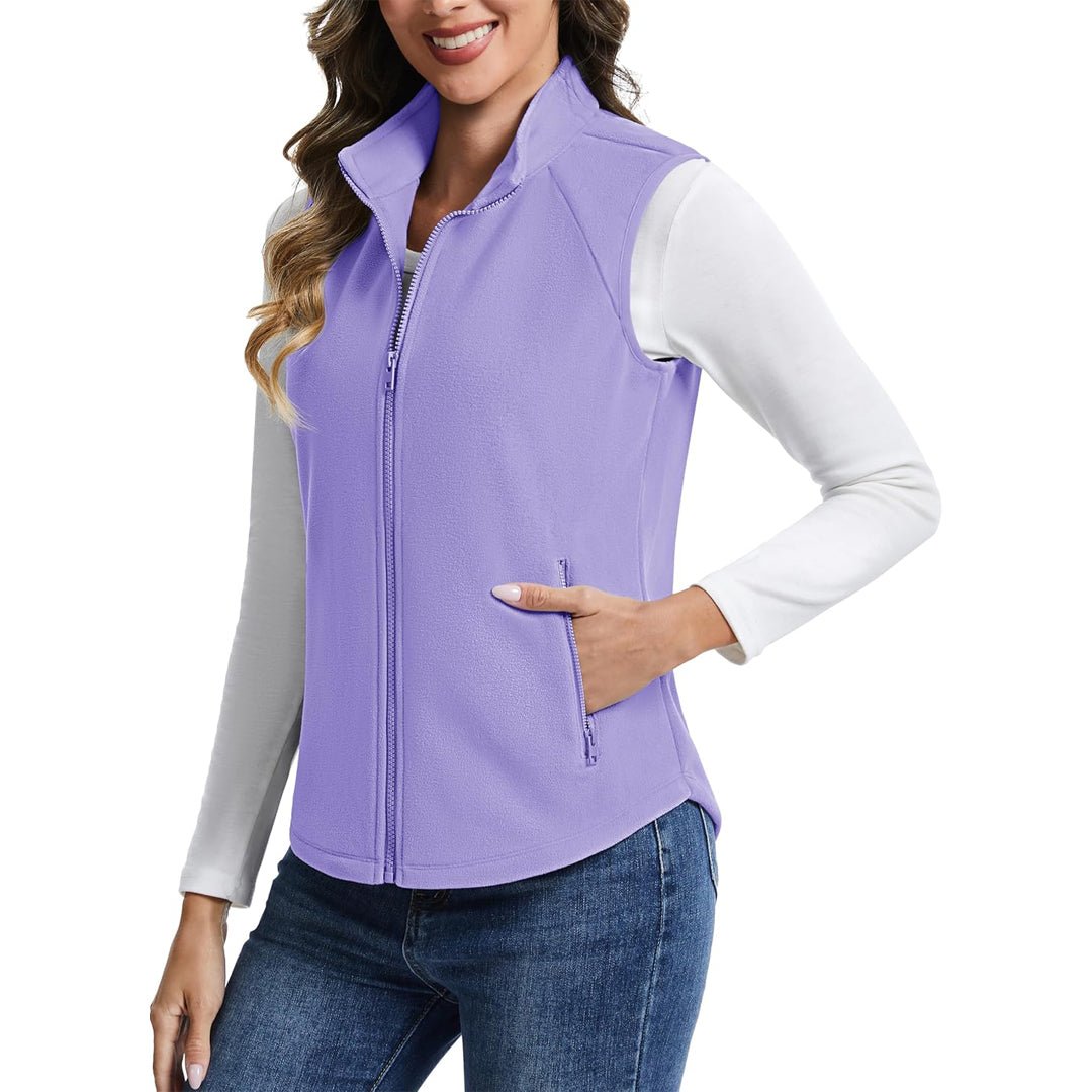 Women's lightweight full-zip fleece vest with stand-up collar, travel-ready warmth in versatile style