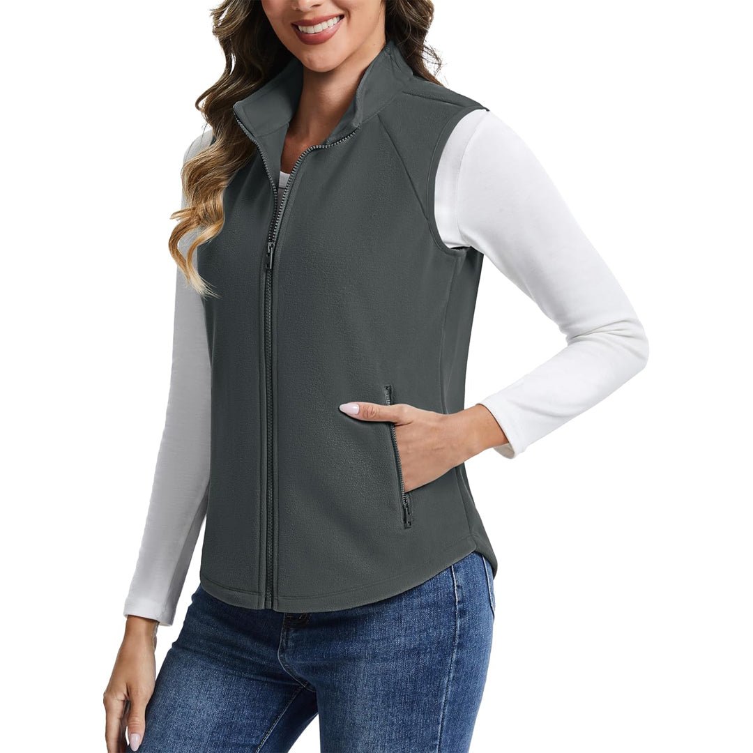 Women's lightweight full-zip fleece vest with stand-up collar, travel-ready warmth in versatile style