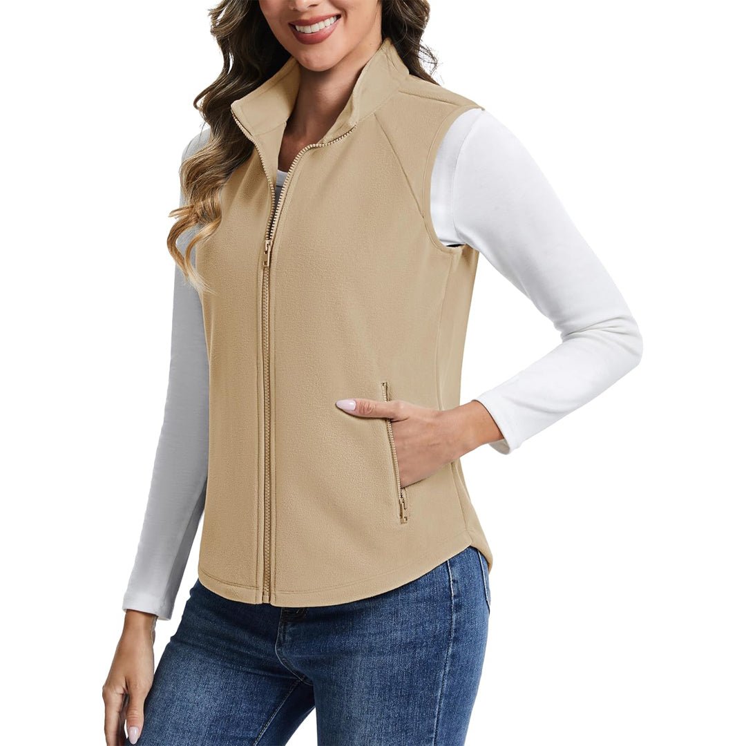 Women's lightweight full-zip fleece vest with stand-up collar, travel-ready warmth in soft polyester