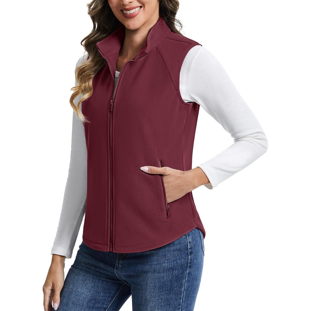 Women's lightweight full-zip fleece vest with stand-up collar, travel-ready warmth in soft polyester