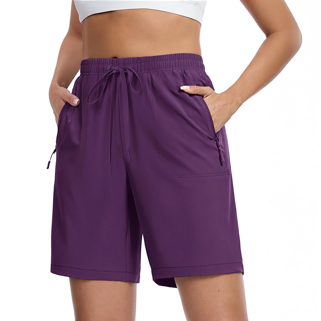 Women's lightweight quick-dry hiking shorts in neutral tone with 8-inch inseam and multi-pocket design