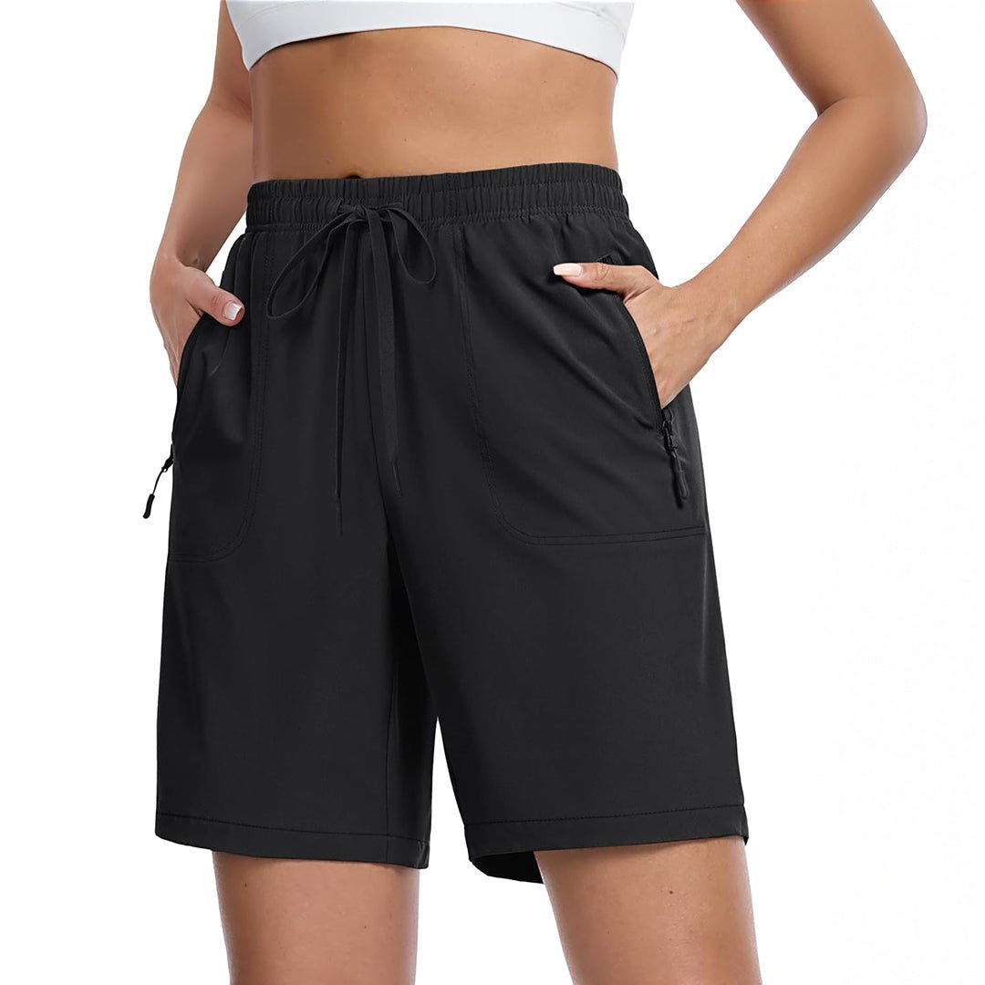 Women's lightweight quick-dry hiking shorts in neutral tone with 8-inch inseam and multi-pocket design