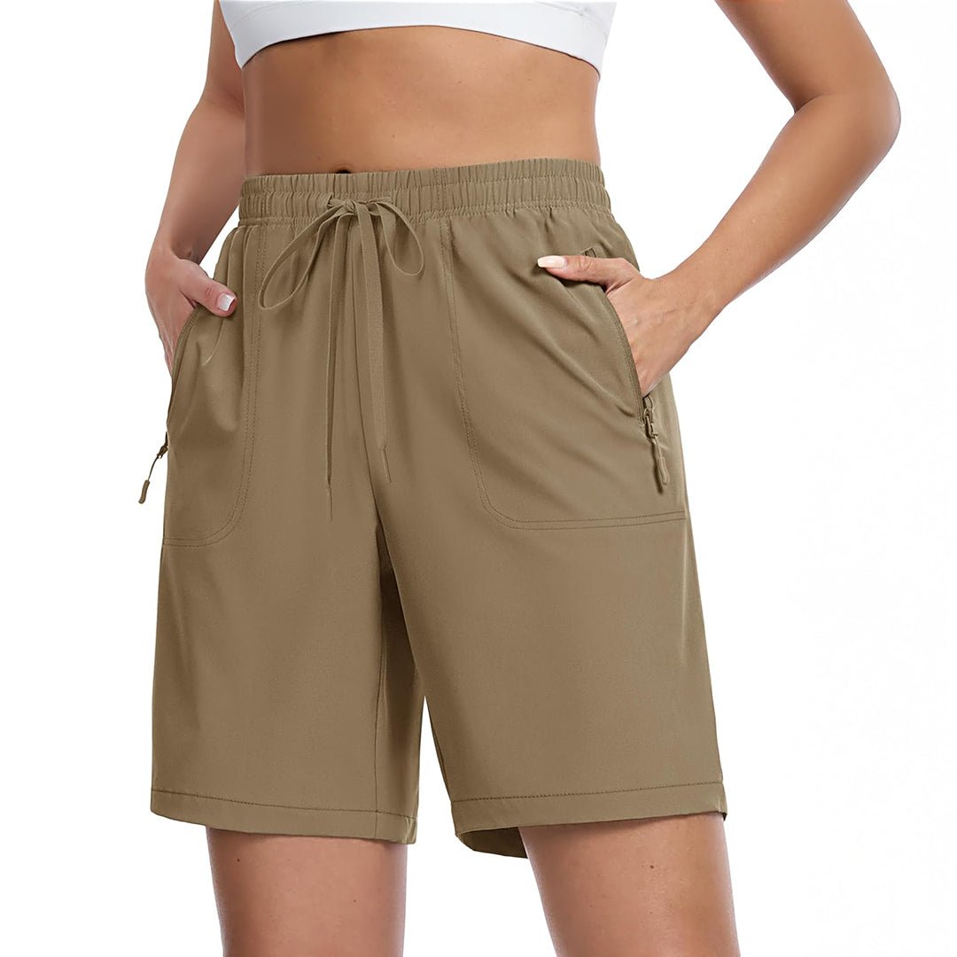 Women's lightweight quick-dry hiking shorts in neutral tone with 8-inch inseam and multi-pocket design