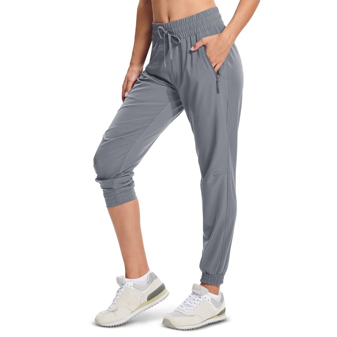 Women's lightweight quick-dry hiking jogger pants with 3 zip pockets and adjustable drawstring waist
