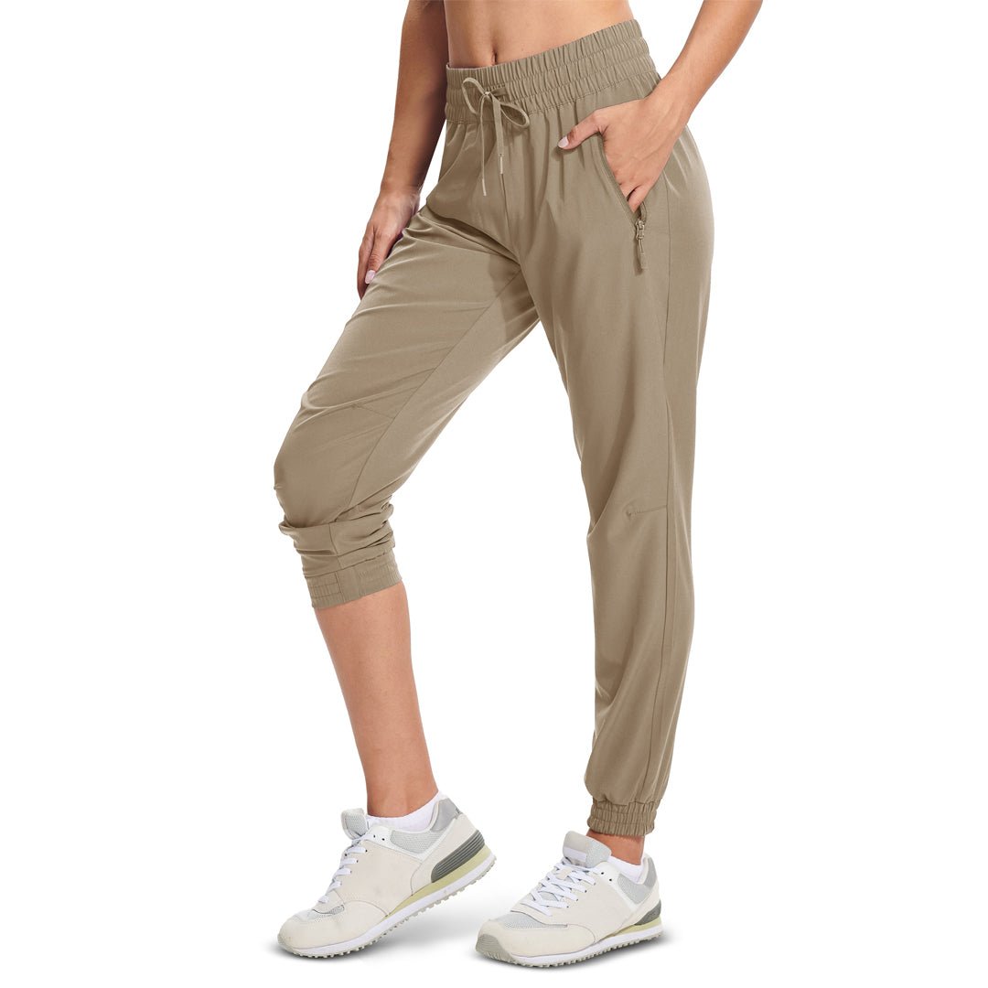 Women's lightweight quick-dry hiking jogger pants with adjustable drawstring waist and 3 zip pockets