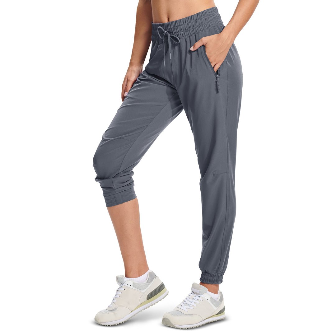 Women's lightweight quick-dry hiking jogger pants with 3 zip pockets and adjustable drawstring waist
