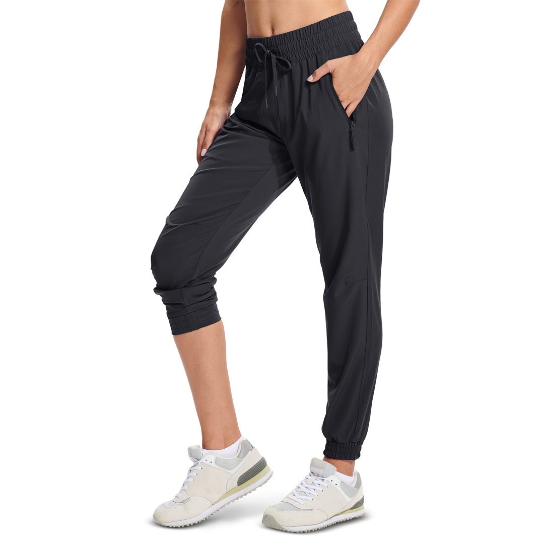 Women's lightweight quick-dry hiking jogger pants with adjustable drawstring waist and 3 zip pockets