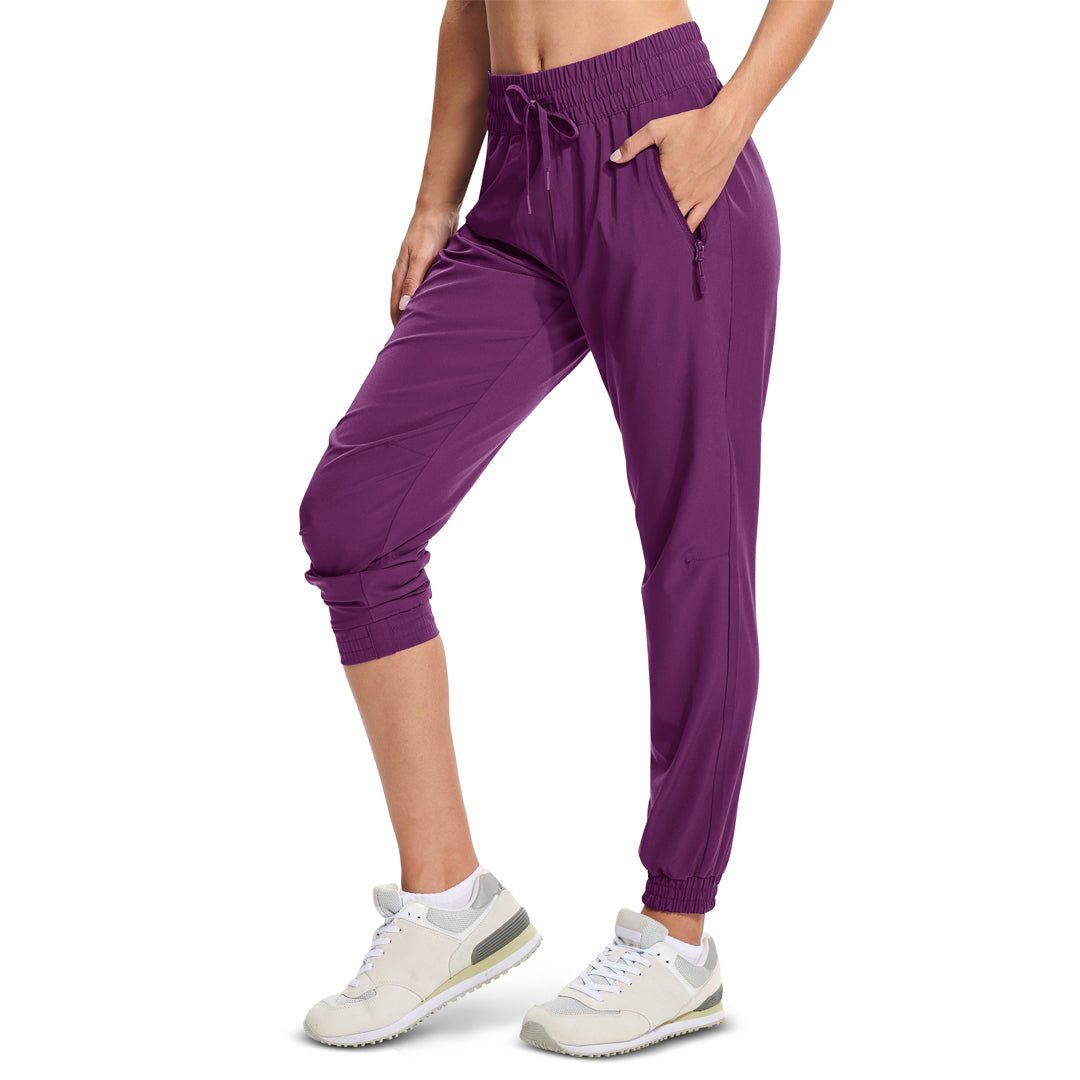 Women's lightweight quick-dry hiking jogger pants with adjustable drawstring waist and 3 zip pockets
