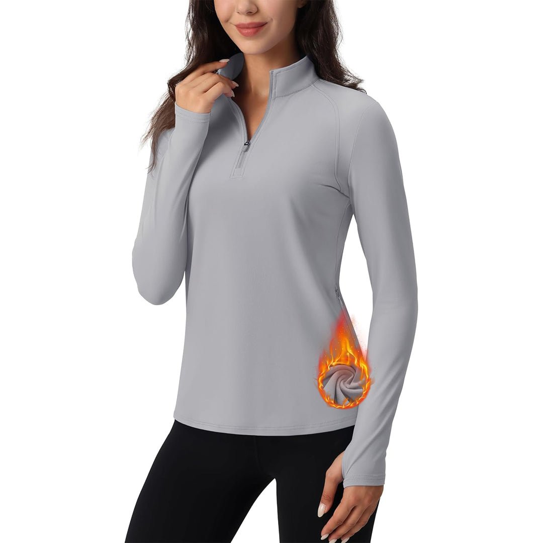Women's long sleeve quarter-zip running top, moisture-wicking stretch fabric with hidden pockets