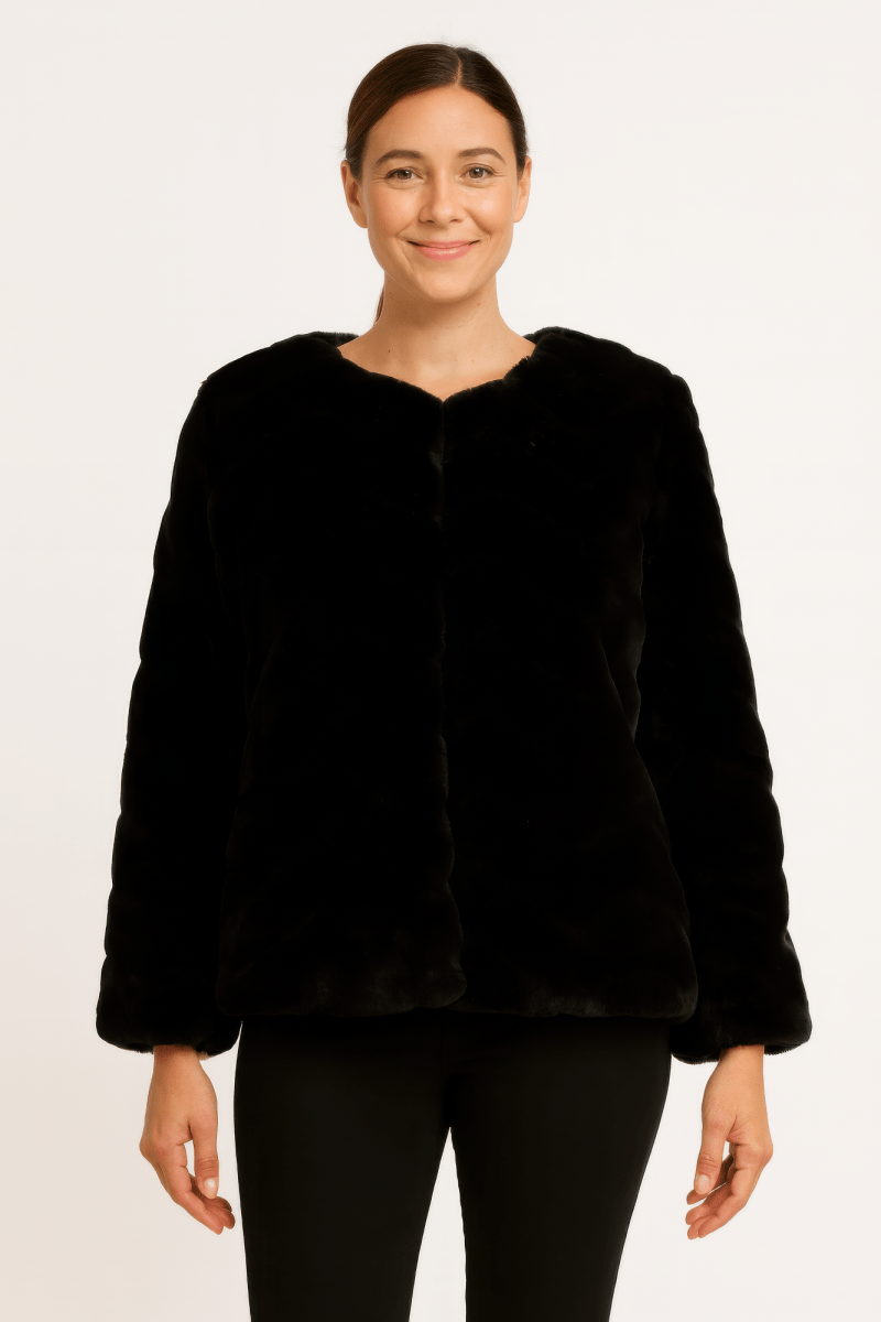 Women's plush faux fur jacket with satin lining, tailored hip-length fit, luxurious texture