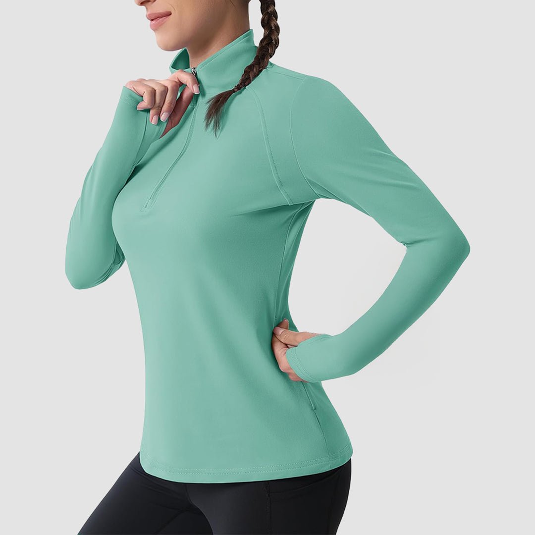Women's slim fit thermal quarter zip running shirt with brushed interior for warmth and moisture wicking