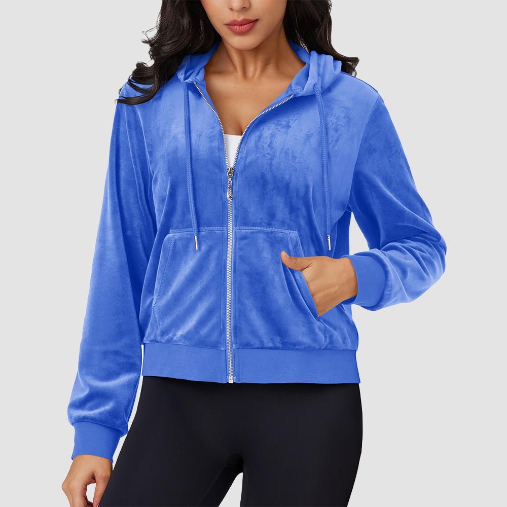 Women's black velvet crop hoodie jacket with zip pockets, soft velour fabric and flattering silhouette
