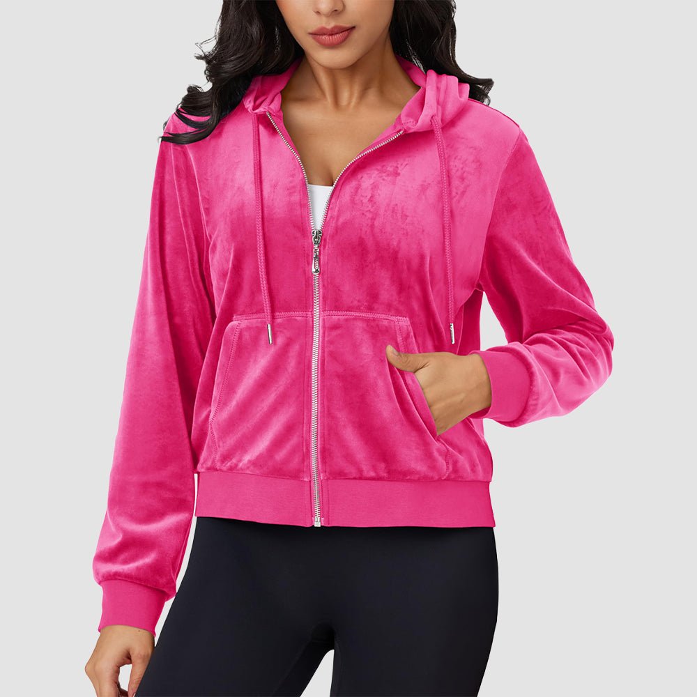 Women's burgundy velvet crop hoodie jacket with zip pockets, soft velour fabric and flattering silhouette
