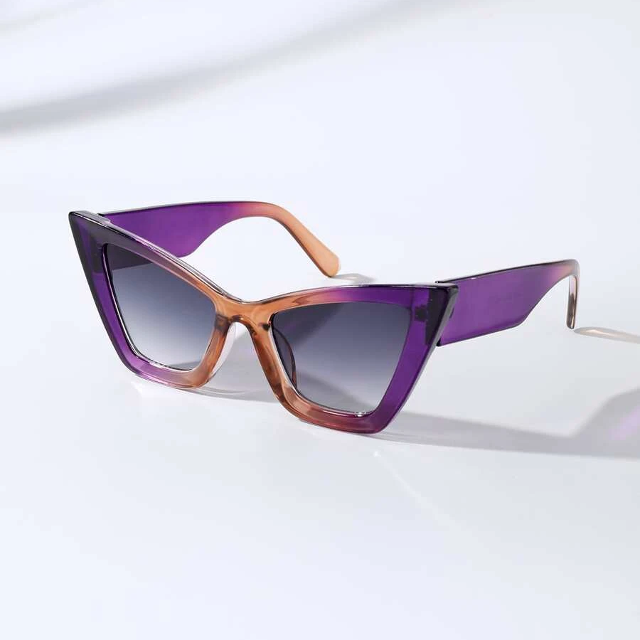 Bold black cat-eye sunglasses UV400 protection sharp angular retro-modern frame for women