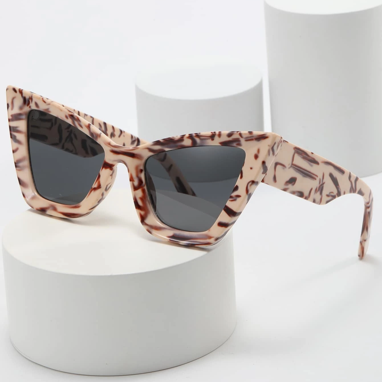 Bold black cat-eye sunglasses UV400 protection retro angular frame modern chic style