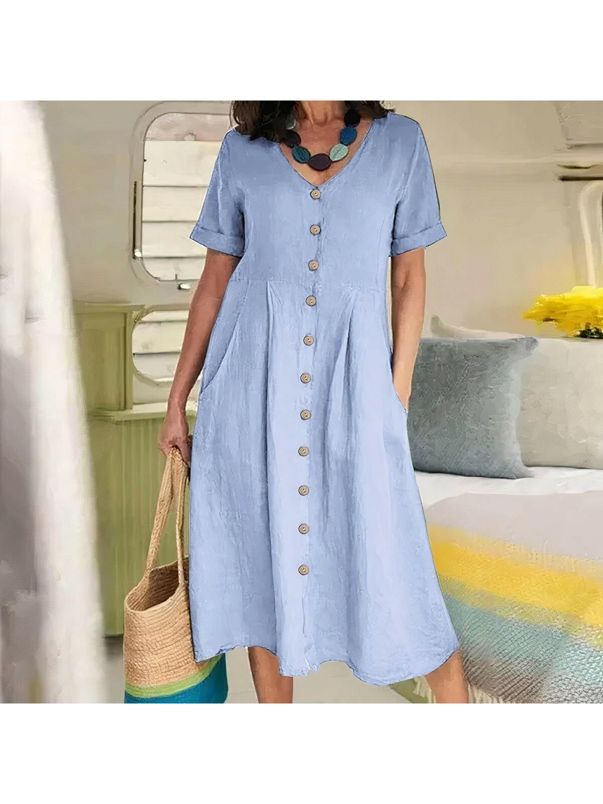 Yasmin relaxed-fit button-front dress in neutral tone, effortless silhouette for modern women