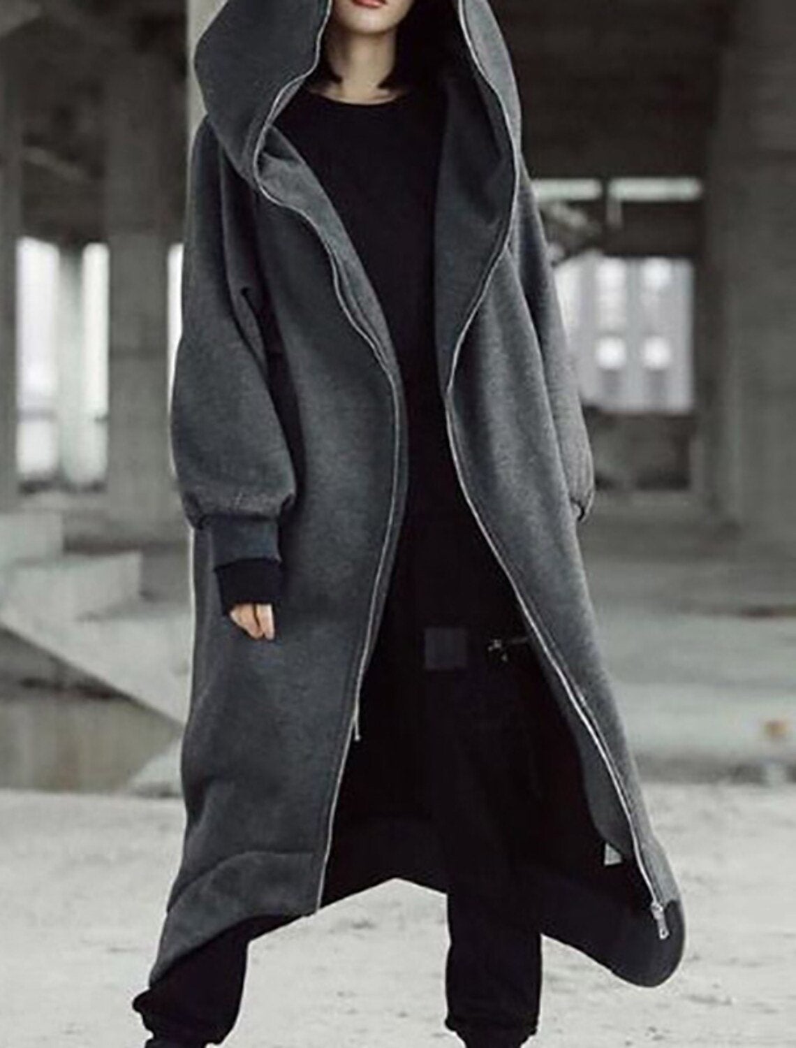 Women's long hooded winter coat calf-length silhouette urban elegance refined outerwear fashion