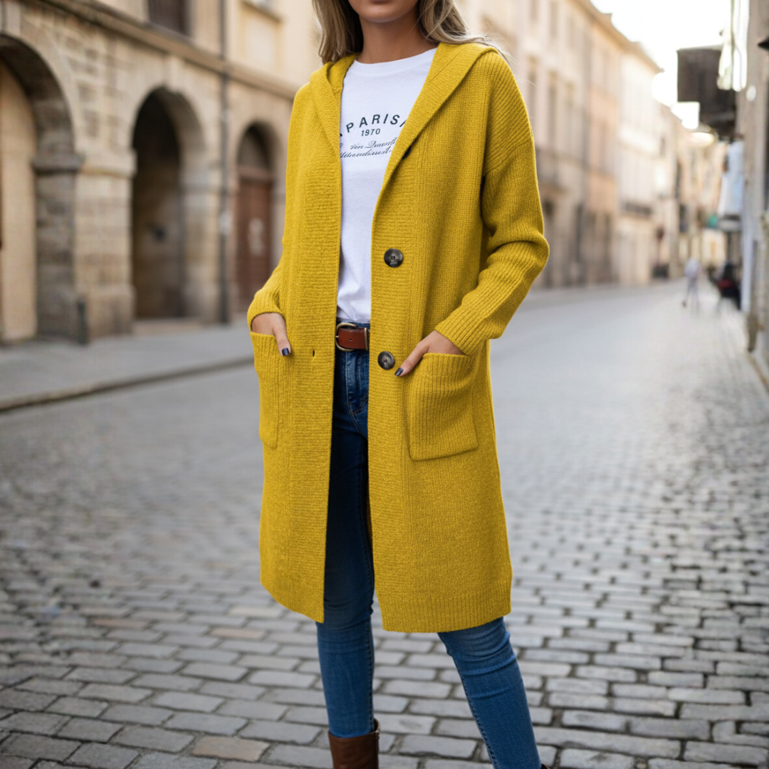 Women's long hooded knit cardigan with front pockets and button closure, cozy acrylic everyday essential