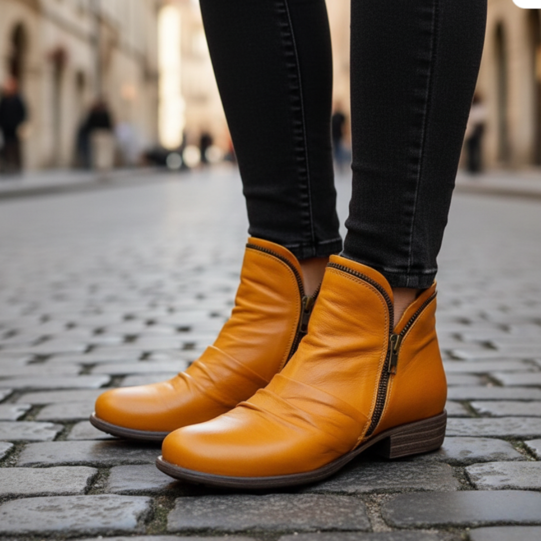 Women's black ankle boots with side zipper, elegant silhouette, casual everyday style for versatile wear