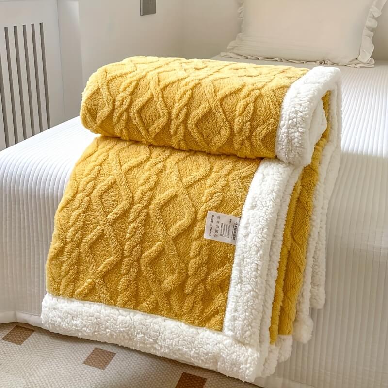 Ivory sherpa throw blanket with diamond texture, dual-sided fleece design for cozy modern home decor