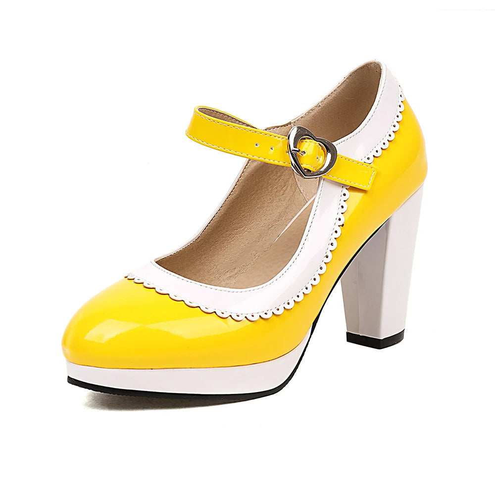 Black patent vegan leather Mary Jane heels with scalloped edges and heart-shaped buckle, retro vintage style